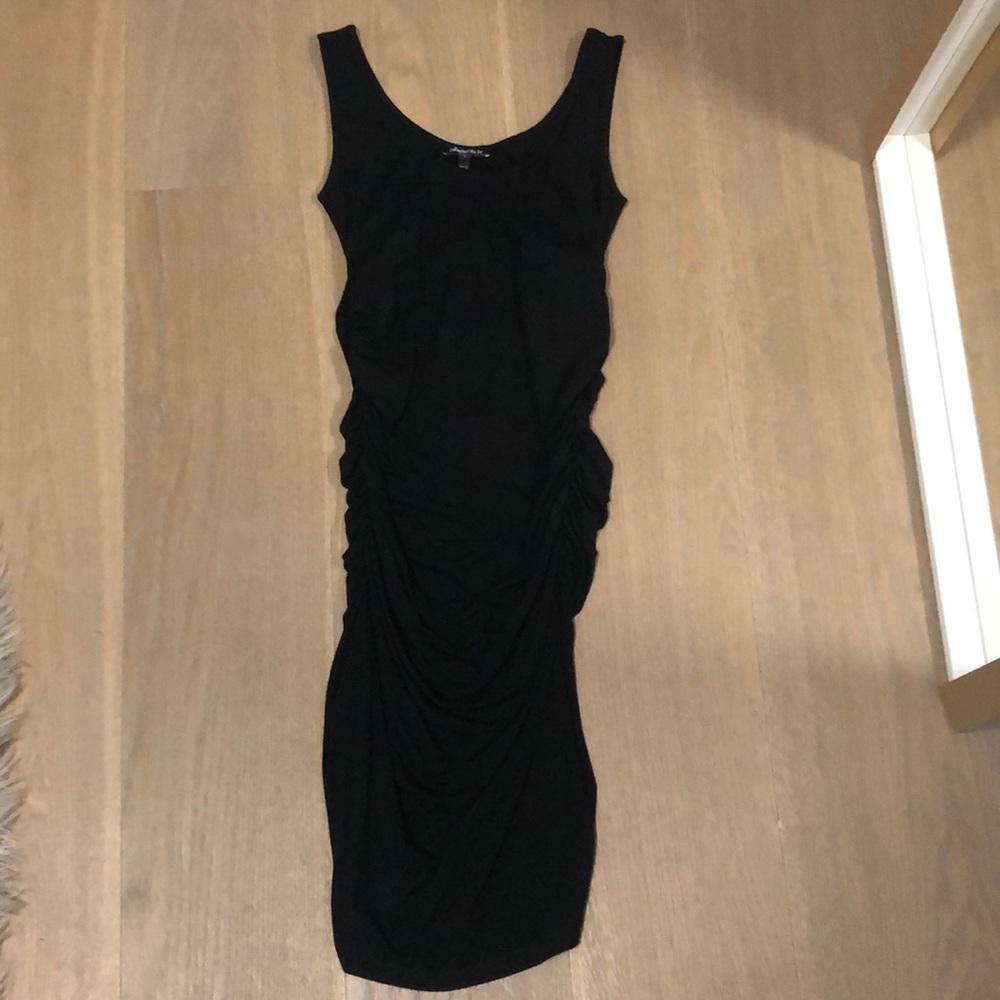 Maternity. Gently ruched side seams flatter your figure.